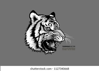 Tiger head black and white silhouette mascot.