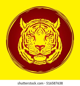 Tiger head designed on grunge circle graphic vector.