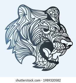 Tiger head in detailed style. Zentangle tiger. Geometric Ethnic motif with rhombus, triangles. Graphic style. For print, web, textile, wrapping paper.