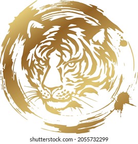 Tiger head. Gold silhouette of a tiger head isolated on white background. The symbol of the Chinese New Year. Vector image.