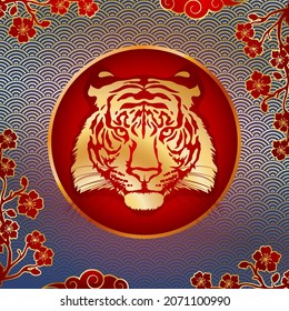 Tiger head. Gold silhouette of a tiger head on a red background with a pattern. The symbol of the Chinese New Year. Vector image.