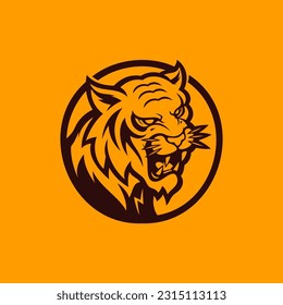 Tiger head inside circular frame. Premium animal logotype vector illustration.