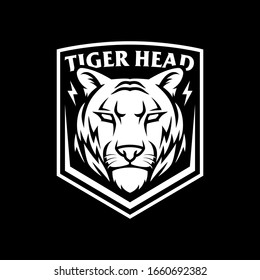 Plantilla del logotipo de la cabeza del tigre sobre fondo oscuro
