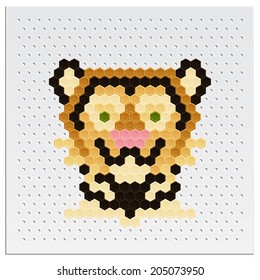 Tiger head made ??up of a mosaic of different colors on a light board for mosaic 
