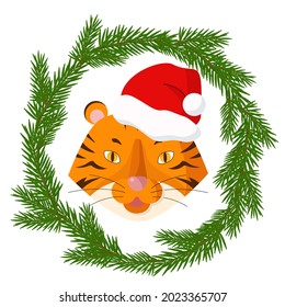 Tiger head with New Year's Santa hat. Christmas tree wreath