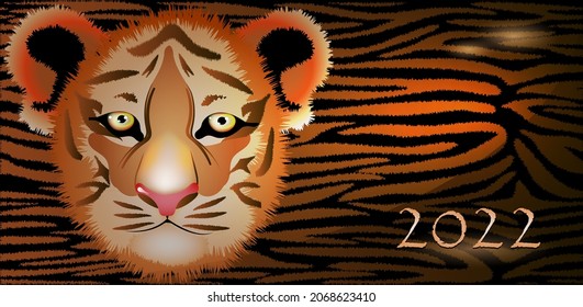 Tiger head on a striped background. Symbol of 2022