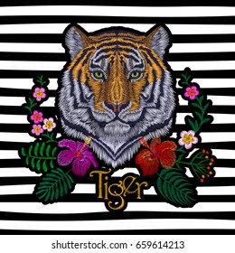 Tiger head tropic flower. Front view embroidery patch sticker. Orange striped black wild animal stitch texture textile print. Jungle logo vector illustration art