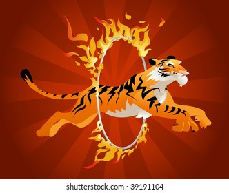 Tiger jumping through a hoop of fire.