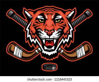 tiger mascot head with crossed hockey sticks for school, college or league sports