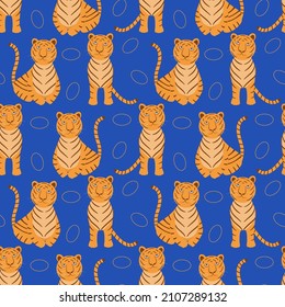 Tiger on a blue background with circles. Seamless vector pattern. Cartoon tiger.