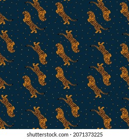 The tiger pattern of 2022 is a symbol of the year. Background with a tiger wild animal. Illustration for textiles for the new year. Vector illustration