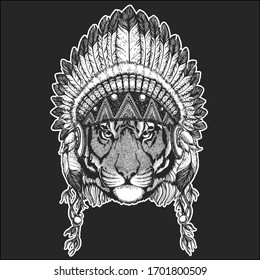 Tiger portrait. Wild cat head. Indian tribal traditional headdress with feathers.