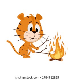 Tiger roasts marshmallows on a wood fire. Cute cartoon character. The tiger is the symbol of the year 2022. Vector illustration for children. Isolated on a white background.