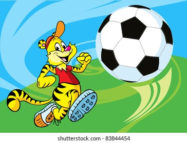 Tiger runs a soccer ball