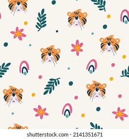 Tiger seamless pattern. Muzzle of a cute tiger cub with jungle plants. Tropical Animals. Children design for fabric, print, wrapper, textile. Vector flat illustration for kids

