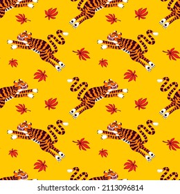 Tiger seamless pattern, vector animal print with cute tigers, and Japanese maple leaves. Organic flat style vector illustration.