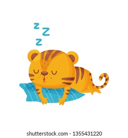 Tiger sleeping on pillow on white background.