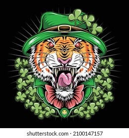 tigre ST. Patrick's Day lleva un abrigo y sombrero con hojas de trébol