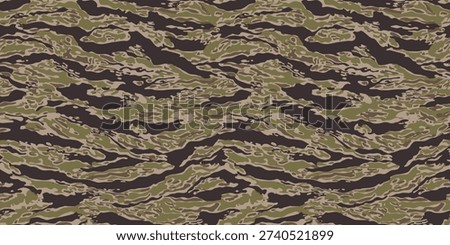 Tiger stripe camouflage pattern.  Hunting camouflage. Camouflage seamless pattern. Forest real tree camouflage design. Tiger stripe pattern.