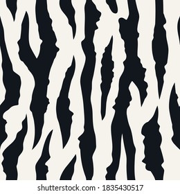 Tiger stripes seamless pattern. Abstract striped background stylized as a tiger skin