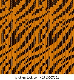 Tiger stripes seamless pattern with realistic knit texture. Modern animal print. Vector illustration.