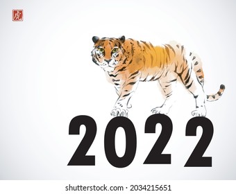 Tiger, symbol of the chinese new year 2022, hand drawn with ink. Traditional oriental ink painting sumi-e, u-sin, go-hua. Hieroglyph - tiger.