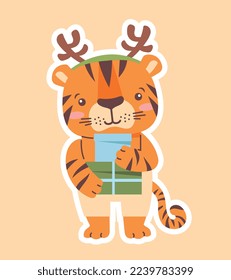 Tiger symbol icon. Cute character wearing deer ears reading letter or holding gift. Greeting and invitation card. Christmas and New Year. Winter holidays and culture. Cartoon flat vector illustration