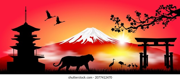 Tiger as a symbol of the upcoming New Year according to the Eastern calendar. Japanese landscape with Mount Fuji. Cranes, a pagoda and a gate are visible in the rays of the rising sun.