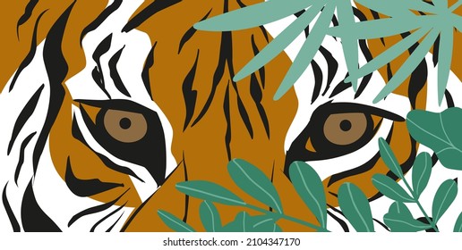 tiger in tropical leaves. eyes of a predatory animal. symbol of 2022