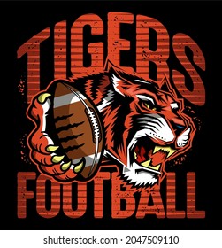 tigers football team design with mascot holding ball in paw for school, college or league