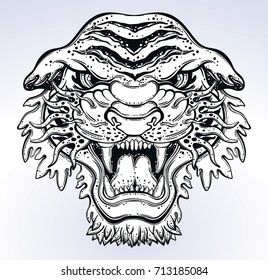 Tiger's portrait made in an old-stylized tattoo. Vector illustration for coloring book, t-shirts, tattoo art, boho design, posters, textiles. Isolated vector illustration.