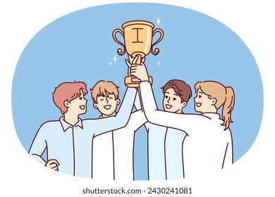 Tight-knit team of office workers raises golden cup over heads rejoicing at best sales results. Men and women hold first place prize after winning best startup competition