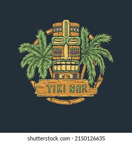 Tiki bar with tiki mask, wooden signboard and tropical leaves of palm for summer hawaii surfing and tropic exotic beach