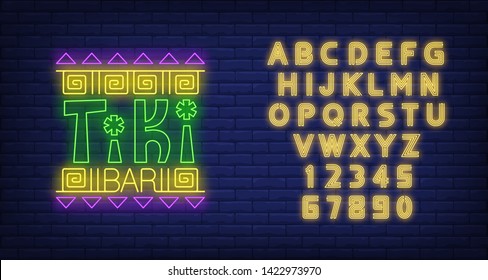 Tiki bar neon text with ethnic ornament. Resort, party, vacation design. Night bright neon sign, colorful billboard, light banner. Vector illustration in neon style.