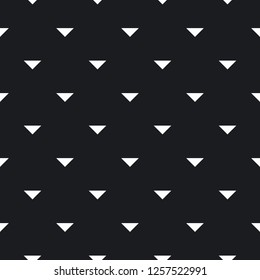 Tile pattern with black triangles on white background. Seamless vector pattern. Abstract geometric design.