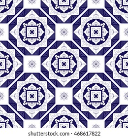 Tile pattern from diagonal dark blue and white ornaments. Portuguese azulejo, mexican, spanish, moroccan motifs. Tiles floor design. Background for wallpaper, surface texture, wrapping or fabric.