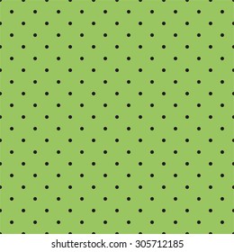 Tile spring pattern with black polka dots on fresh grass green background.