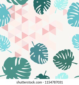 Tile tropical vector pattern with green exotic leaves on triangle background