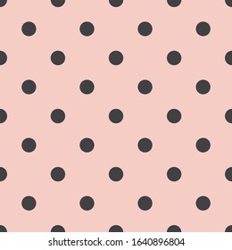 Tile  vector pattern with black polka dots on pastel pink background