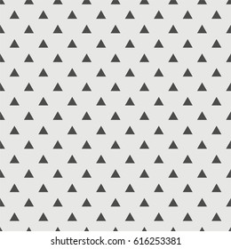Tile vector pattern with black triangles on grey background