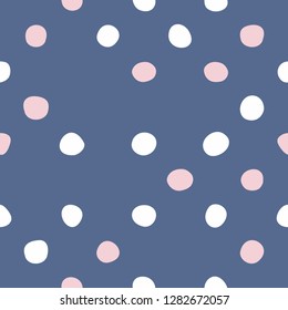 Tile vector pattern with pastel hand drawn dots on blue background