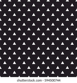 Tile vector pattern with white triangles on black background