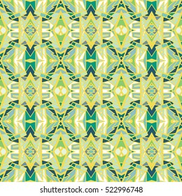 Tiled background with oriental ornaments. Aztec, mexican background. Ethnic tile seamless pattern. Hand drawn boho repeating pattern. Colorful blue yellow geometric seamless texture for swimwear.