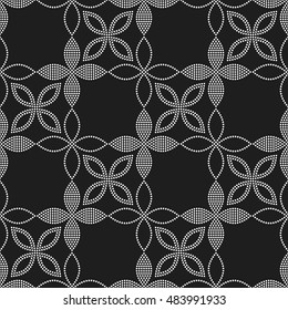 Tiled seamless flower pattern with dotted petals. Floral motif. Beads. Garlands. Abstract black and white mosaic background. Vector illustration.