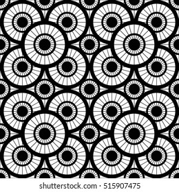 Tiled seamless geometric pattern of circles divided into sections. Grid. Oriental motif. Abstract black and white background. Monochrome print. Vector illustration.