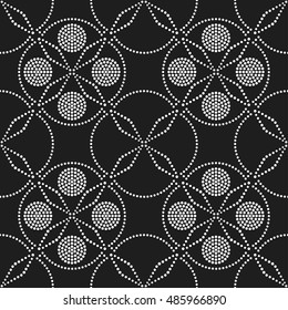 Tiled seamless geometric pattern of dotted petals and circles. Arabic motif. Beads. Abstract black and white mosaic background. Vector illustration.