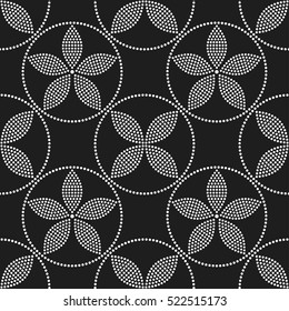 Tiled seamless geometric pattern of dotted circle with flowers in the center. Floral motif. Beads. Abstract black and white mosaic background. Vector illustration.