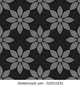 Tiled seamless geometric pattern of dotted flowers and petals. Floral motif. Beads. Grid. Abstract black and white mosaic background. Vector illustration.