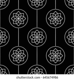 Tiled seamless geometric pattern of dotted flowers, circles and garlands. Beads. Abstract black and white mosaic background. Vector Illustration.