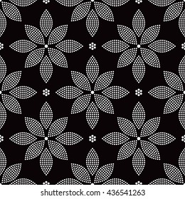 Tiled seamless geometric trellis pattern of dotted petals and flowers. Tracery Floral motif. Beads. Abstract black and white mosaic background. Vector illustration.